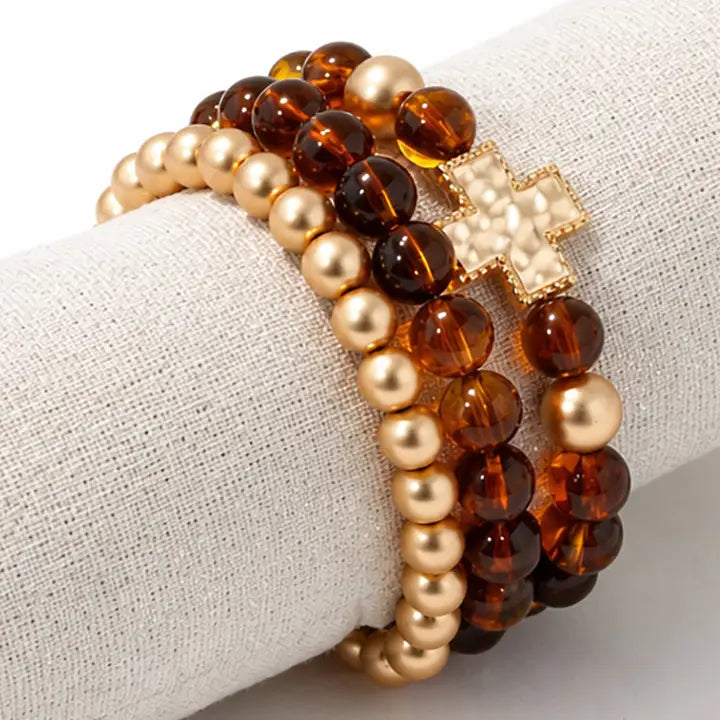 BROWN AND GOLD W CROSS BRACELET