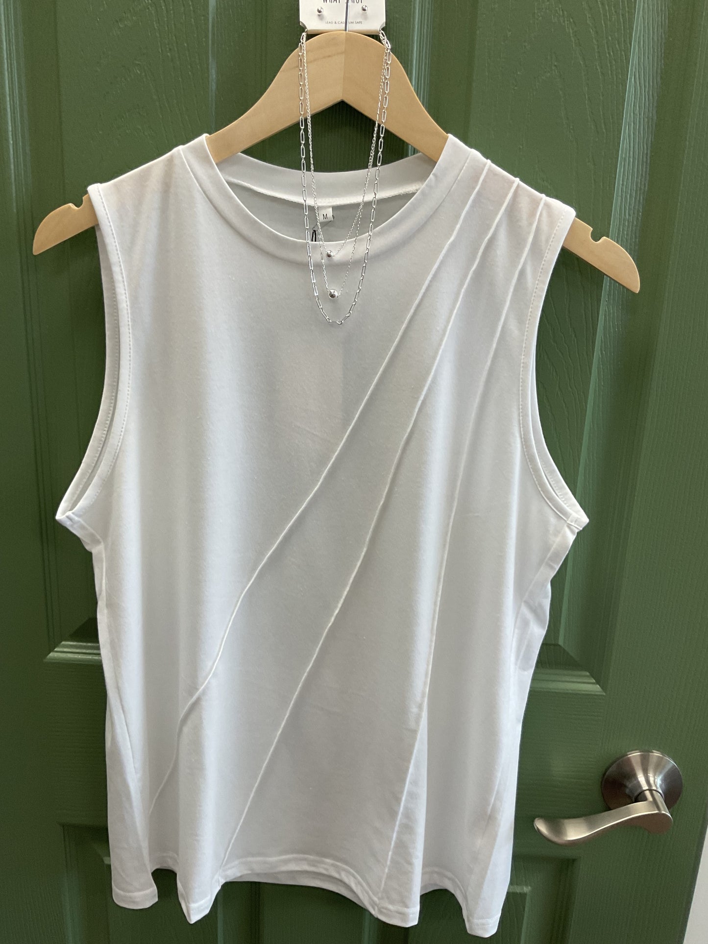 White tank top seams down front