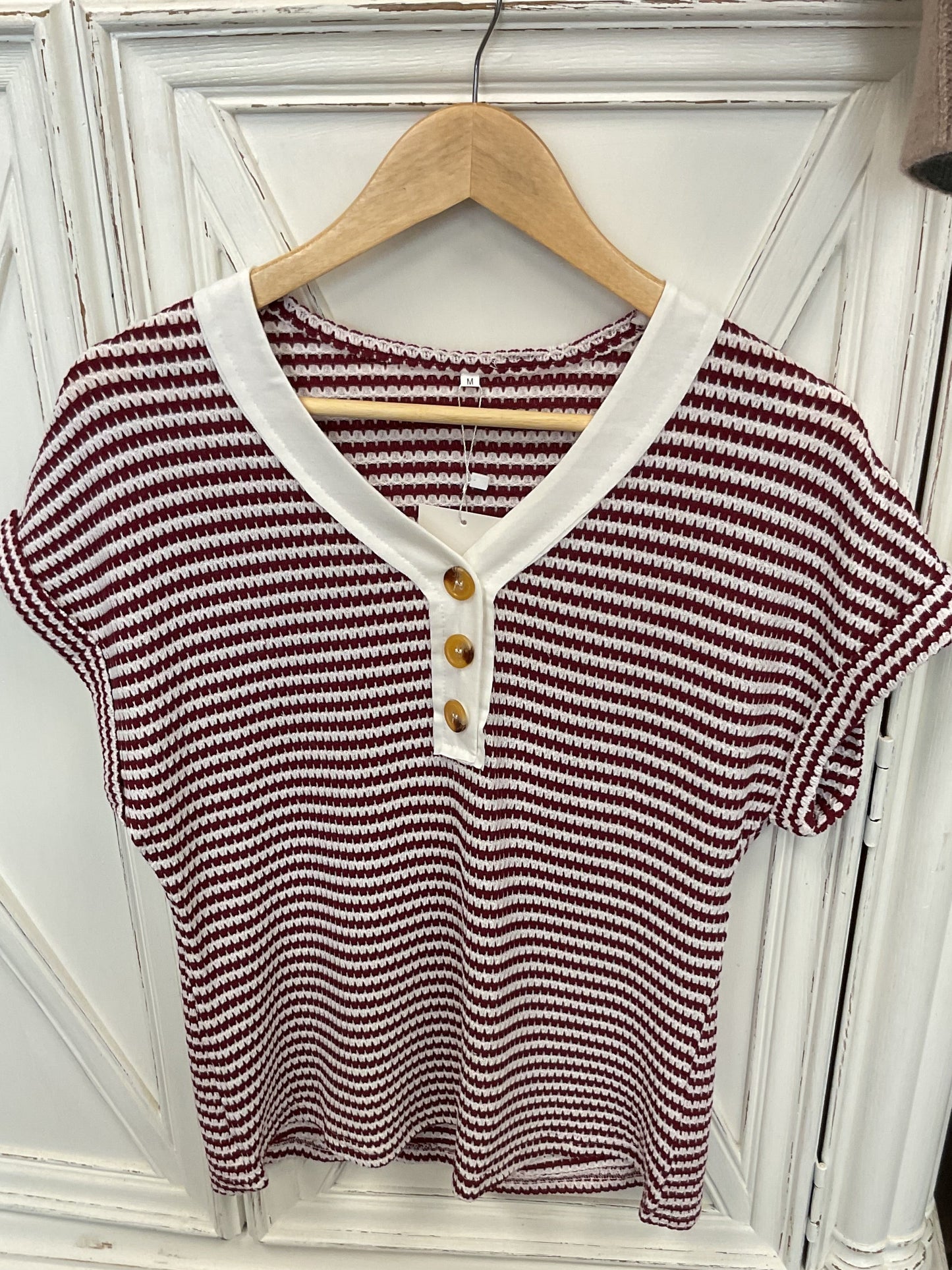 Short sleeve burgundy and cream, striped V-neck with buttons