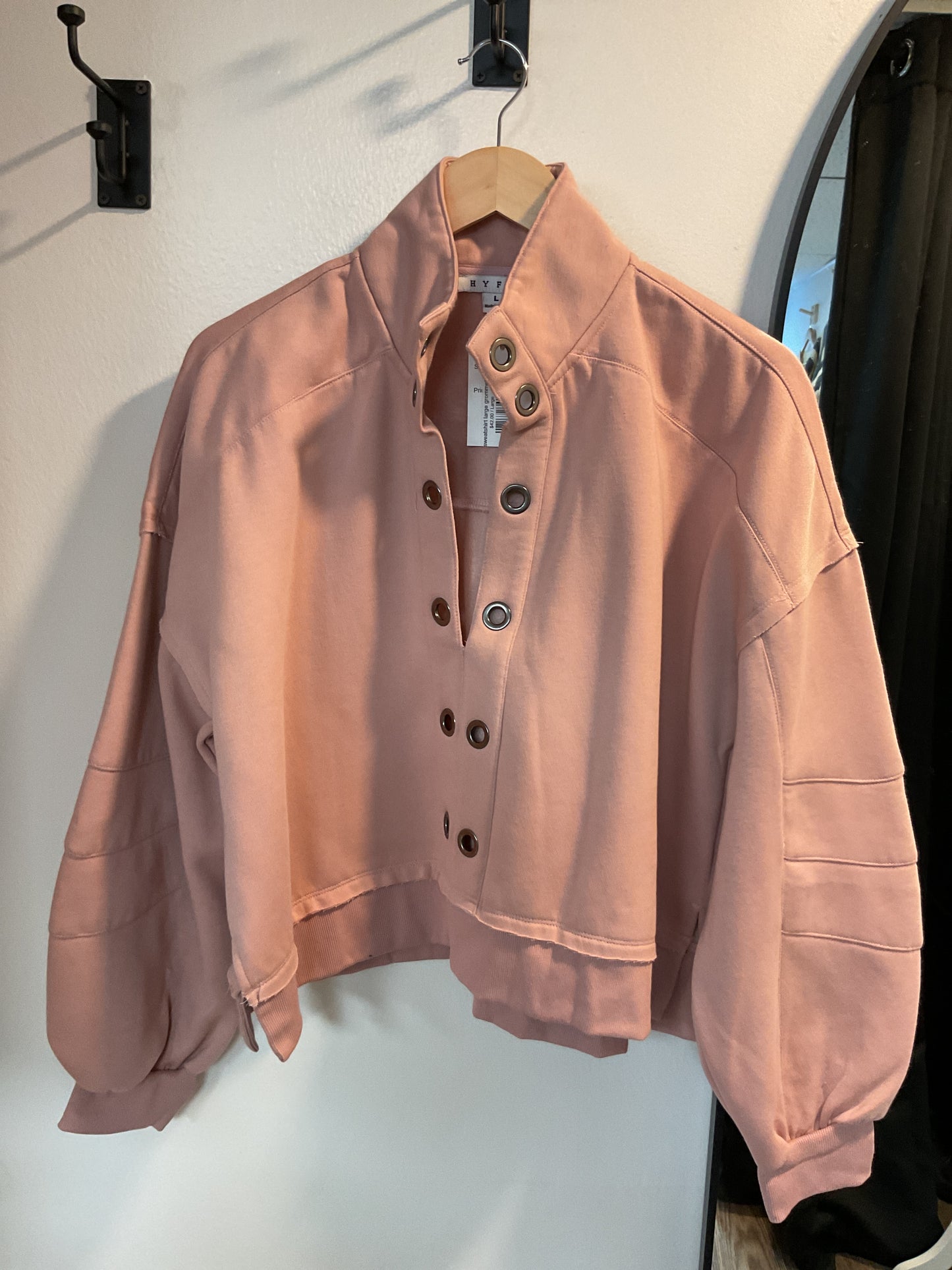 Mauve sweatshirt large grommets v neck