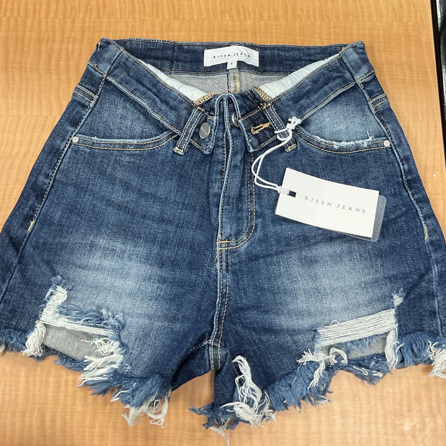 Denim distressed Risen shorts flipped opening