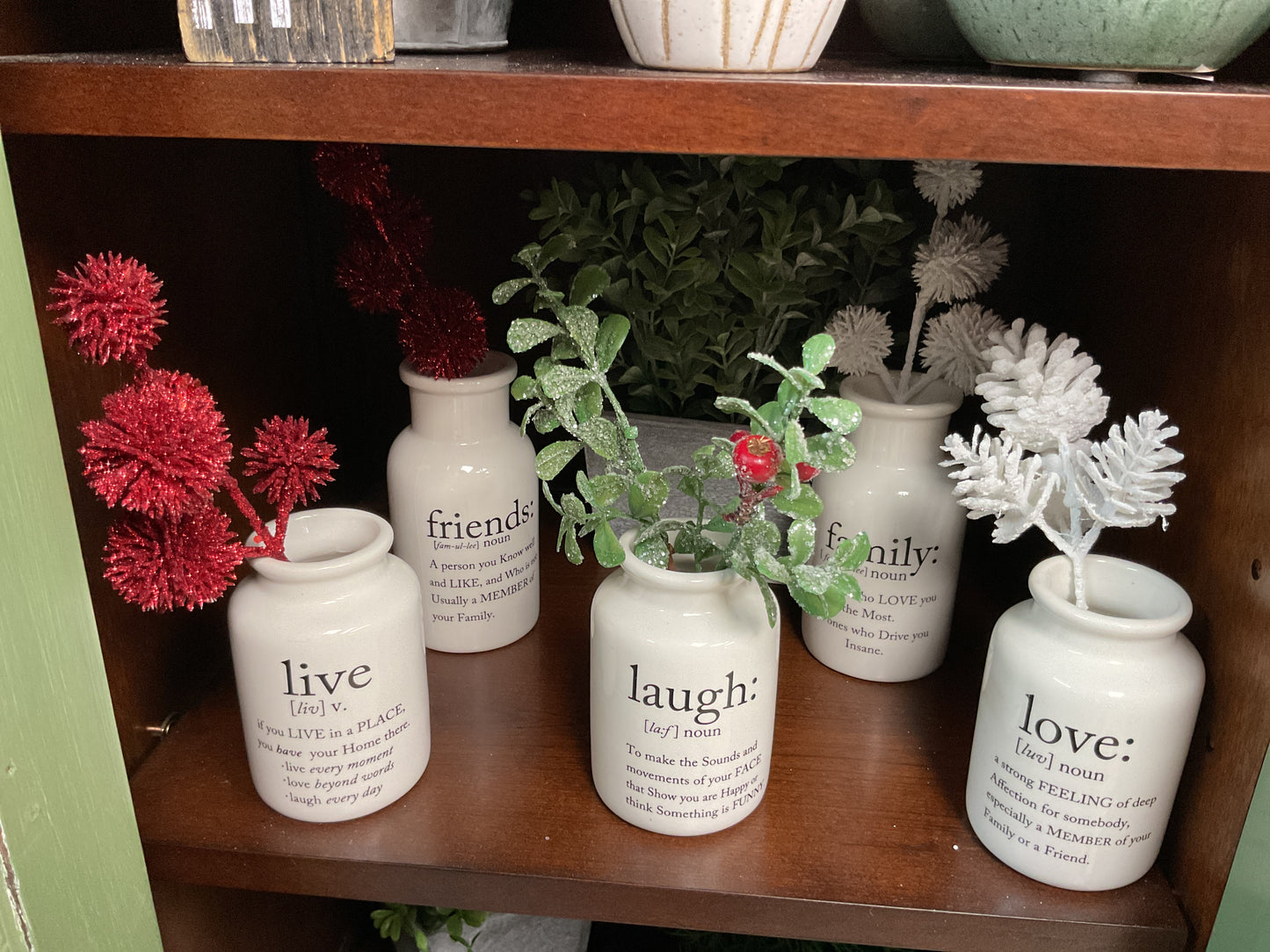 Small inspirational bottles w buds in them