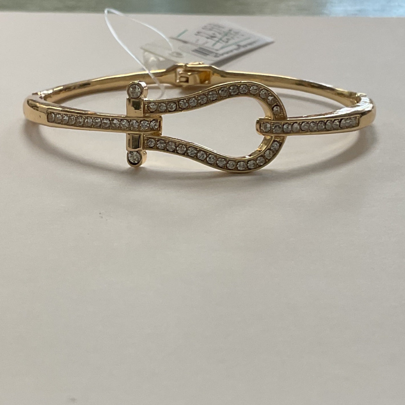 Hinged, gold bangle, rhinestone horseshoe bracelet