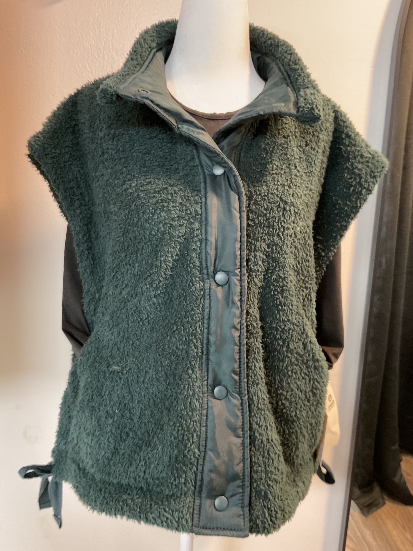 Dark green fuzzy vest