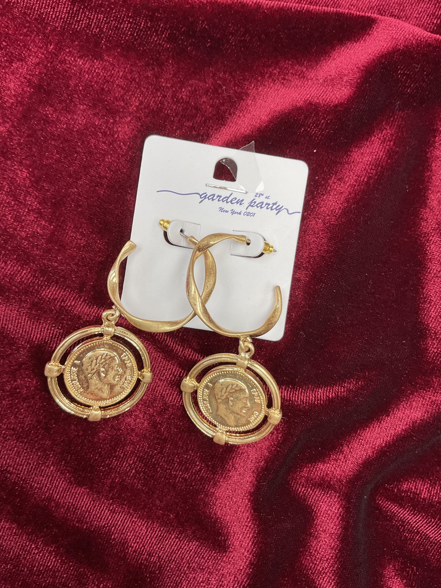 Gold medallion earrings