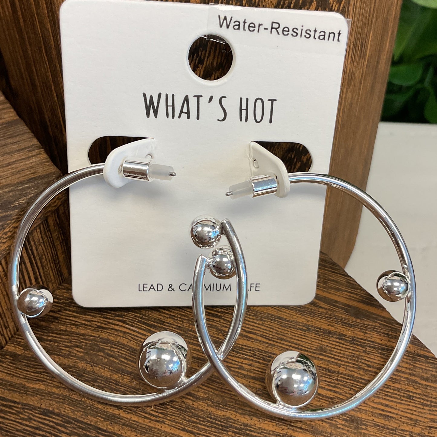 Silver hoop with balls earrings