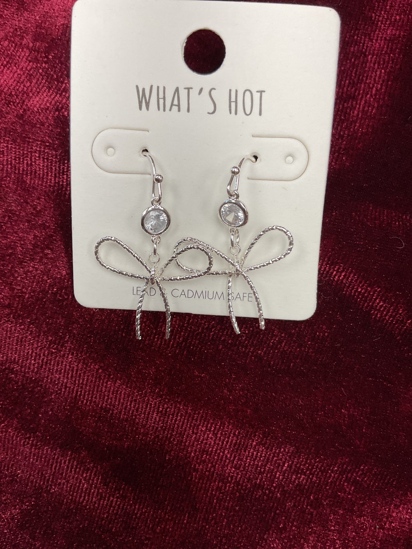 Silver dangling bows