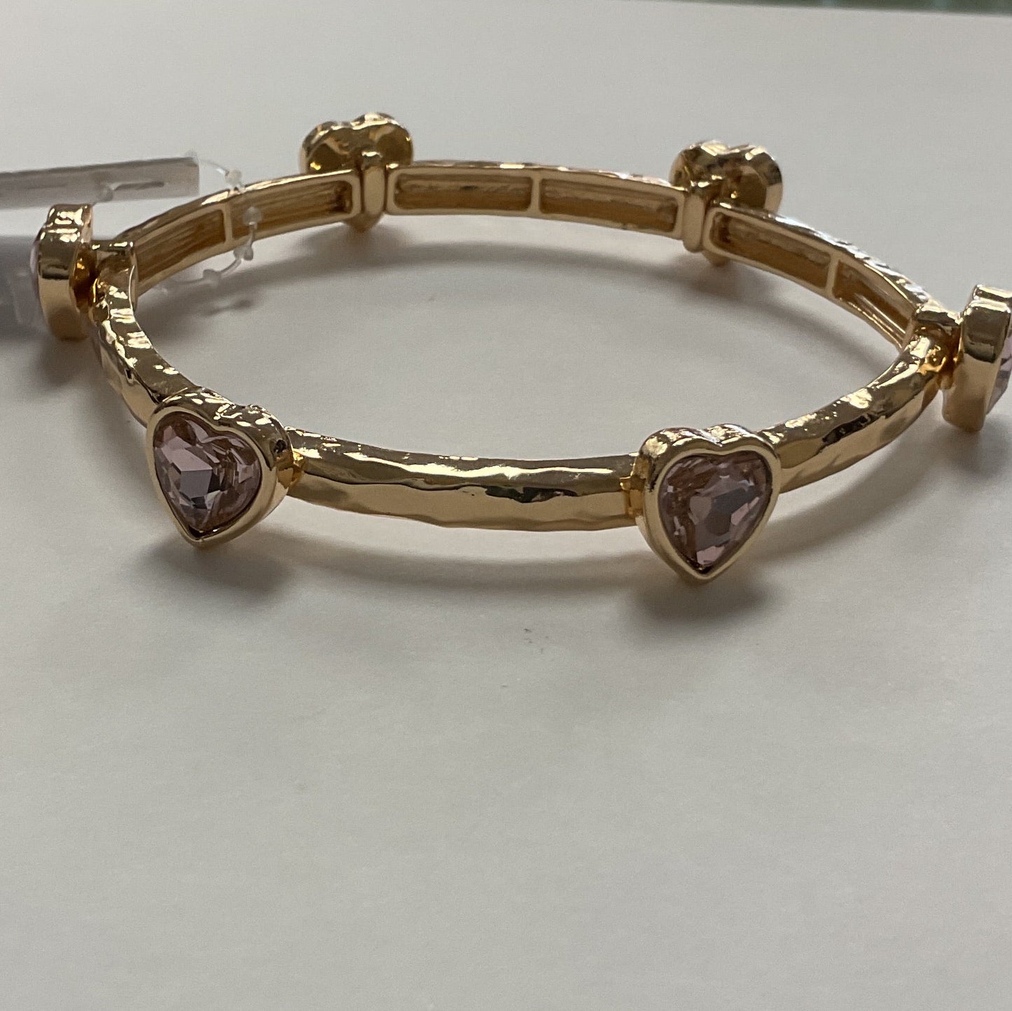 Gold stretch, bracelet, pink gem hearts