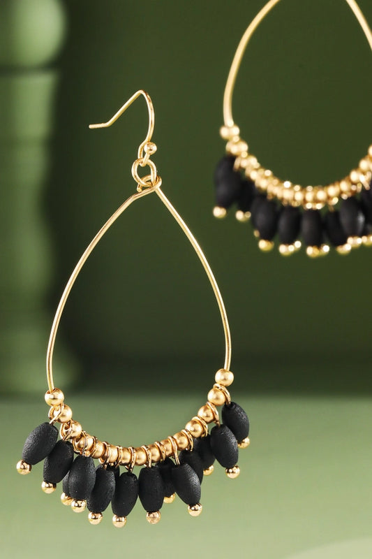 BLACK BEADS AND GOLD HOOP EARRINGS