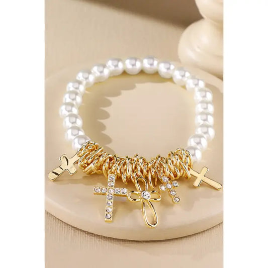 PEARL AND VARIOUS GOLD CROSSES BRACELET