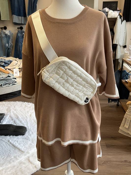 Tan sweater set with white trim, shorts