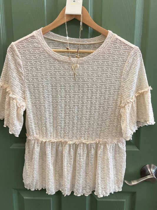 Cream sheer textured short sleeve blouse with ruffle
