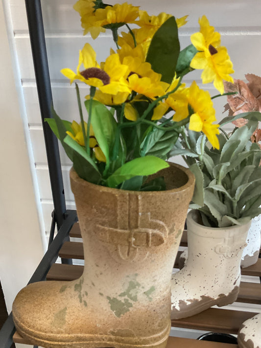Brown boot with daisies