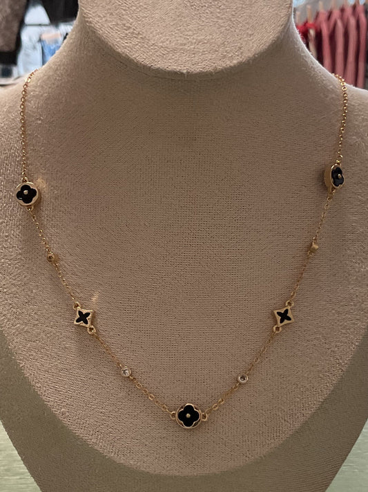 Gold & black star charm necklace