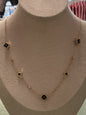 Gold & black star charm necklace
