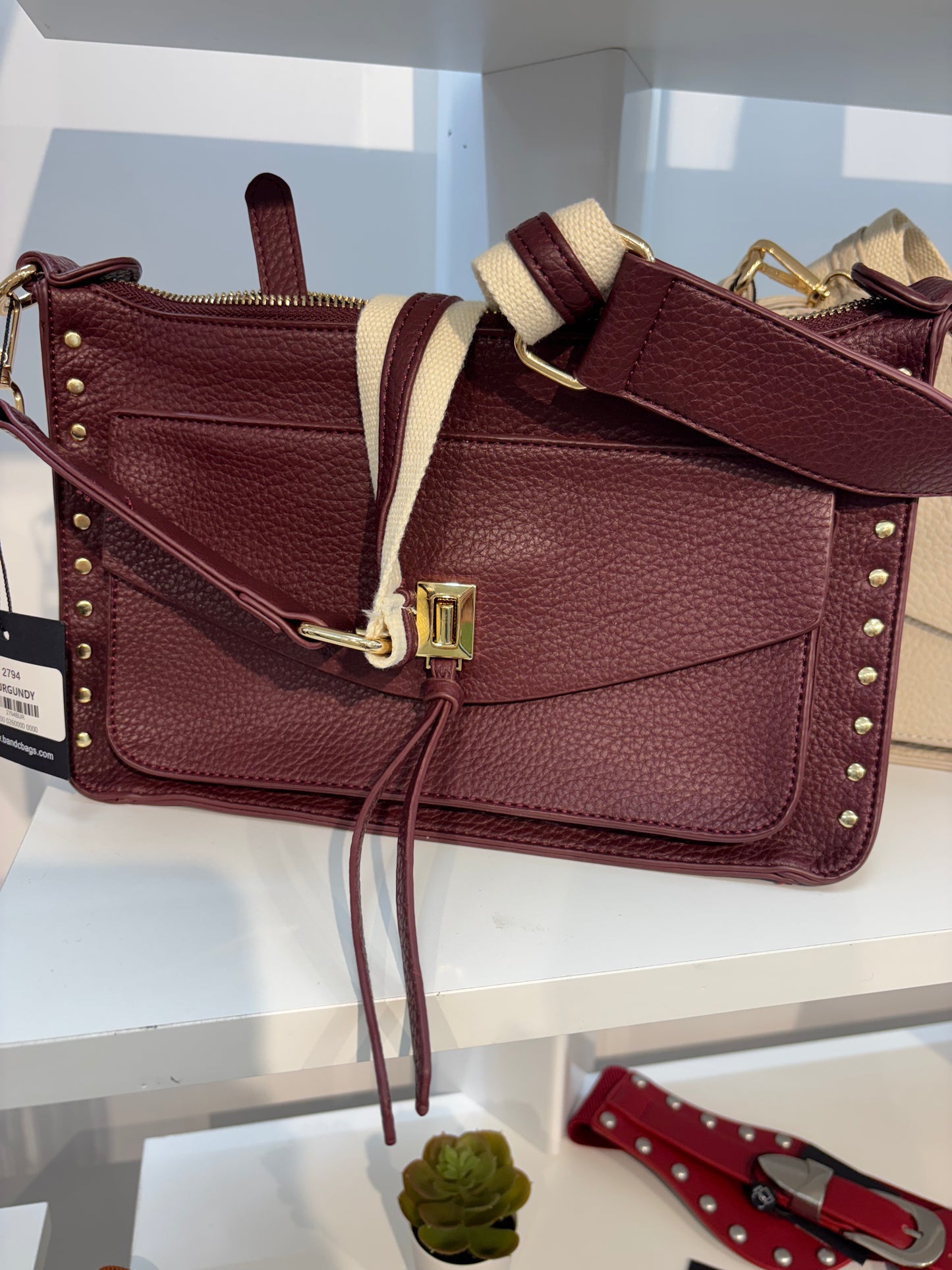 BC RECTANGLE PURSE WITH GOLD STUDS AND TWO STRAPS