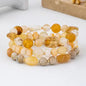 NATURAL MULTICOLOR THREE STRAND BEAD BRACELET