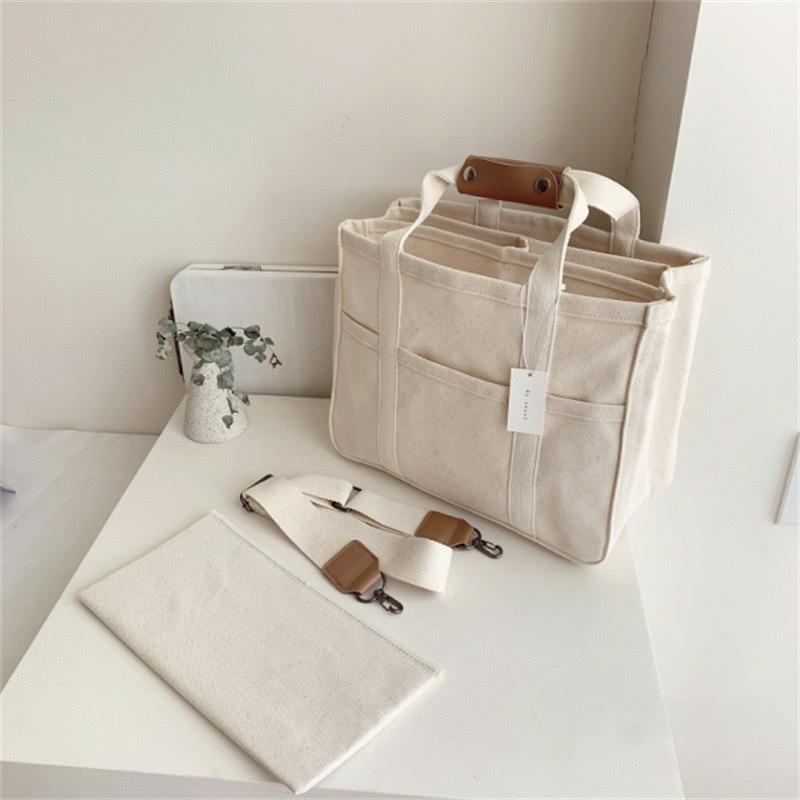 CANVAS CROSSBODY LAPTOP TOTE