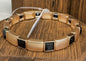 Gold stretch bracelet with black stones