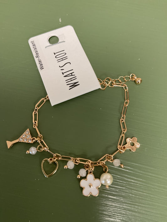 Gold charm bracelet with flower/martini glass/heart/pearl