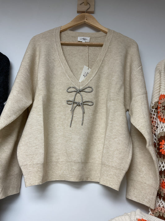 Tan bow holiday sweater