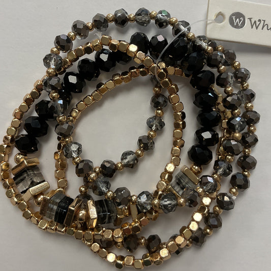 Black and gold set of five stretched bracelets