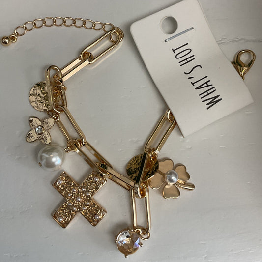 Gold charm bracelet, cross, pearls, gems, clover