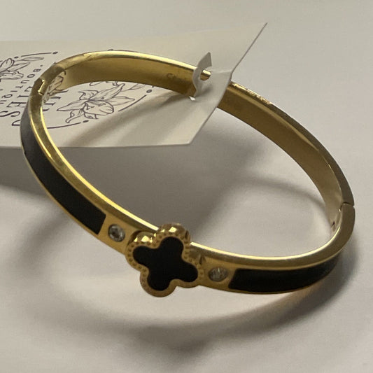 Black clover, gold cuff bracelet