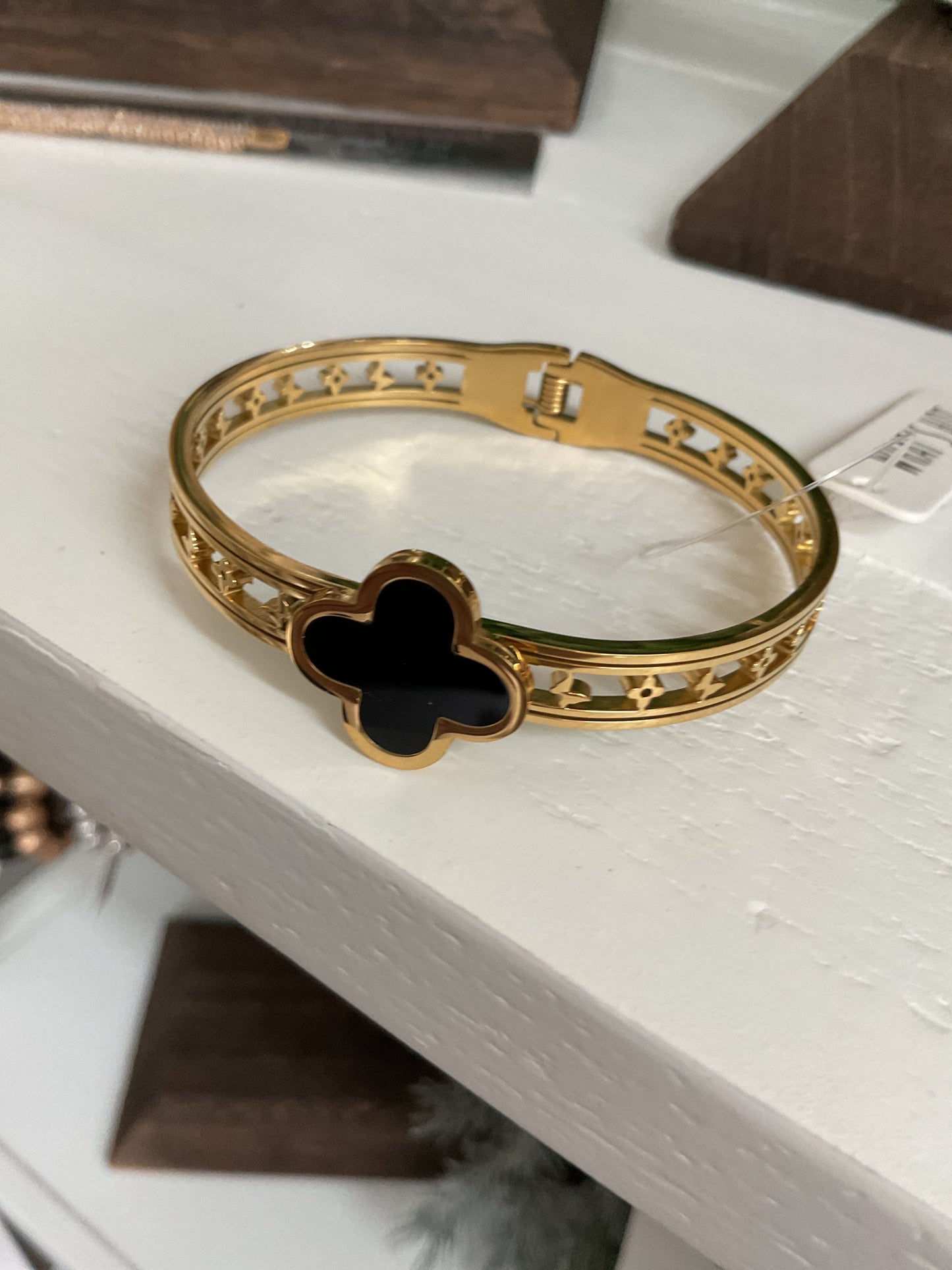 Gold with black clover bracelet