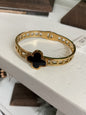 Gold with black clover bracelet