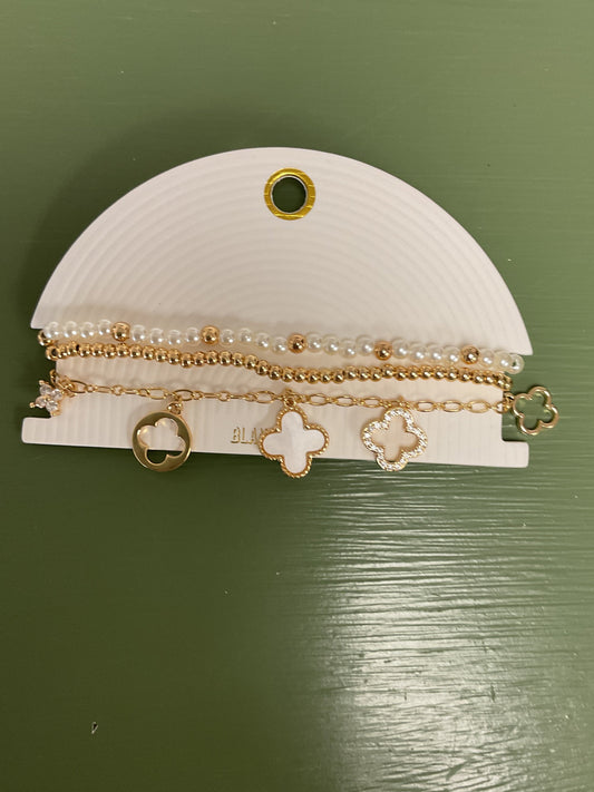 Triple gold, and pearl bracelet, Clover charm