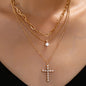 MULTI LAYERED GOLD CHAINS WITH PEARL CROSS